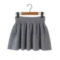 Close-up view of the gray knitted pleated mini skirt texture and elastic high waist line. - S / Mini Skirt