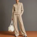 Detail shot of khaki stand-collar cardigan sweatshirt and wide-leg trousers outfit. - S / Top And Bottom / Khaki