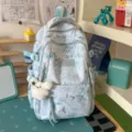 Light blue bamboo print backpack stylish casual school bag for college student daily use. - Backpack / With Pendant / Blue