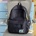 Vintage marbled grey canvas backpack for daily commute, school, and casual travel use. - Single Bag (Without Charms) / Black