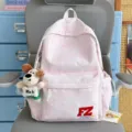 Pink tie-dye backpack for women and men, casual lightweight school bookbag with cute dog pendant. - With Charm / Pink
