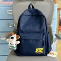 Vintage casual canvas backpack for students with letter embroidery and cute dog pendant. - With Charm / Blue