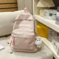 Pink holographic school backpack with cute fluffy plush pendant casual daily commuter bag - With Charm / S / Pink