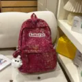 Korean style ins backpack student cute casual commuter school bag with cute pendant design - With Charm / S / Red