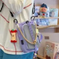 Borsa a tracolla tattica per telefono, elegante borsetta utility con cinturino in corda. - Con Ciondolo / Viola
