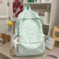 Cute mint green polka dot backpack with hearts and bows, perfect for daily school and casual use. - With Charm / Green