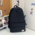 Zaino scolastico minimalista di grande capacità zaino da viaggio casual per uomo e donna - senza ciondolo / Nero