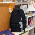 Minimalist large capacity black backpack for school travel casual daily use durable student bag - With Pendant / Black