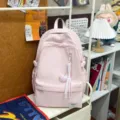 Pink casual backpack for daily use, lightweight school bag with large capacity and cute charm. - With Pendant / Pink