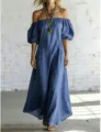 Detailaufnahme des eleganten blauen Maxikleids mit Schulterpartie und schönem Fall. - S / Kleider / Edelsteinblau