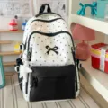 Zaino a pois carino con fiocco e ciondolo a stella, elegante borsa casual da scuola. - Con Ciondolo / Nero