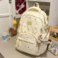 Zaino carino in tela gialla con stampa stelle, orecchie di coniglio e simpatico ciondolo in peluche. - con portachiavi / Giallo