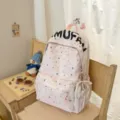 Korean ins style cute star backpack for women and girls, lightweight large capacity casual school bag. - With Charm / Pink