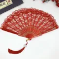 Eventail pliant en dentelle rouge avec pompon accessoire de danse style chinois pour femme - Avec glands / Rouge