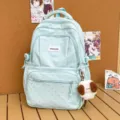 Light blue polka dot student backpack with cute plush dog pendant for daily casual school use. - With Pendant / Blue