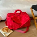 Large capacity red polka dot travel duffel bag for short trips, gym, and portable storage. - Burgundy