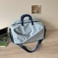 Large capacity travel duffel bag with stylish dotted design, portable and versatile for short trips. - Blue