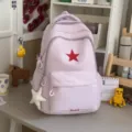 Hübscher lilafarbener Schulranzen mit rotem Stern für den perfekten Alltagslook. - Mit Anhänger / Lila