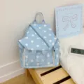 Zaino Ita a pois blu leggero con tasca frontale trasparente, borsa casual per l'uso quotidiano. - Vestibilità regolare / Blu