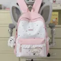 Mochila escolar rosa con estrellas para niñas, diseño bonito con colgante y gran capacidad. - Con Colgante / Rosa