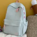 Light blue casual backpack for women, large capacity cute school bookbag for daily commute travel. - No Pendant / Light Blue