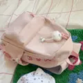 Korean style ins pink large capacity casual backpack for women daily commuting travel bag - With Charm / Pink
