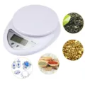 Mini digital kitchen scale for precise food and jewelry weighing with 5kg capacity. - White