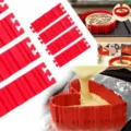 Silicone DIY cake mold detailing scene showing flexible interlocking red baking strips in use. - Red