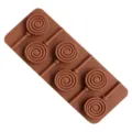 Brown silicone lollipop mold with six swirl candy cavities for DIY baking and crafts. - 6-Cavity Lollipop Mold
