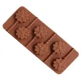 Close-up detail showing the flexible brown silicone daisy lollipop mold texture and cavity design. - 6-Cavity Chrysanthemum Lollipop Mold