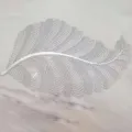Weißes hohles Blatt Tischset im nordischen Stil PVC Isolierung Esstischmatte für Küche. - Silber