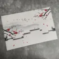 Chinese style PVC woven placemat with ink painting plum blossom design for dining table insulation. - White Walls and Grey Tiles