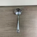 Stainless steel soup ladle for kitchen cooking, durable one-piece long handle spoon tool. - Plain Round Handle Soup Ladle