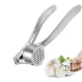 Close-up detail of the durable zinc alloy garlic press with fine crushing holes. - Standard Type