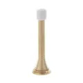 Detail view of a golden spring door stopper with white rubber tip for bedroom protection. - Gold
