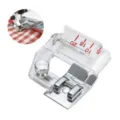 Adjustable sewing machine bias binder foot detail view, clear plastic and metal accessory. - Regular Fit
