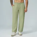 Pantaloni casual da uomo in tessuto waffle con vita elastica e coulisse verde chiaro. - Verde Erba