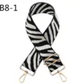 Zebra pattern adjustable bag strap replacement with gold hardware, stylish cross-body strap. - Black and White Zebra