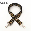 Correa de hombro de repuesto tejida en negro y dorado con hebillas metálicas ajustables para bolsos. - Negro