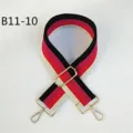 Detail view of adjustable colorful striped bag strap with gold metal hardware and hooks. - Gold / Style B11-10