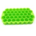 Silicone honeycomb ice cube tray detail view, flexible 37-grid mold for easy release. - Green