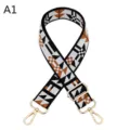 Detailed view of the colorful ethnic geometric replacement bag strap with durable gold hardware. - A1