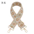 Detail shot of the wide ethnic embroidered bag strap with golden metal hardware and hooks. - Gold / X-6 Khaki Brown
