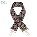 Detailed view of the ethnic embroidered bag strap with floral pattern and gold hardware. - X-11 Black Pink Beige