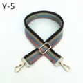 Replacement bag strap detail showing colorful striped webbing and gold hardware parts. - Silver Buckle / Y-4 Black Pink Stripe