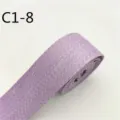 Dettaglio in primo piano del nastro jacquard viola a trama semplice, con tessitura e rifinitura. - C1-8 Viola Chiaro