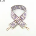 Close-up of ethnic jacquard bag strap with adjustable gold metal hardware and durable clasps. - Gold / C-22 Purple Floral