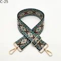 Ethnic jacquard bag strap detail showing colorful geometric pattern and gold hardware. - Gold / C-25 Black Green Floral