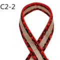 Close-up detail of the ethnic jacquard webbing featuring leopard pattern and gold metallic thread. - C2-2