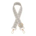 Detailed view of the woven ethnic style bag strap with adjustable gold tone hardware buckles. - Silver Buckle / Z8 Beige Gray